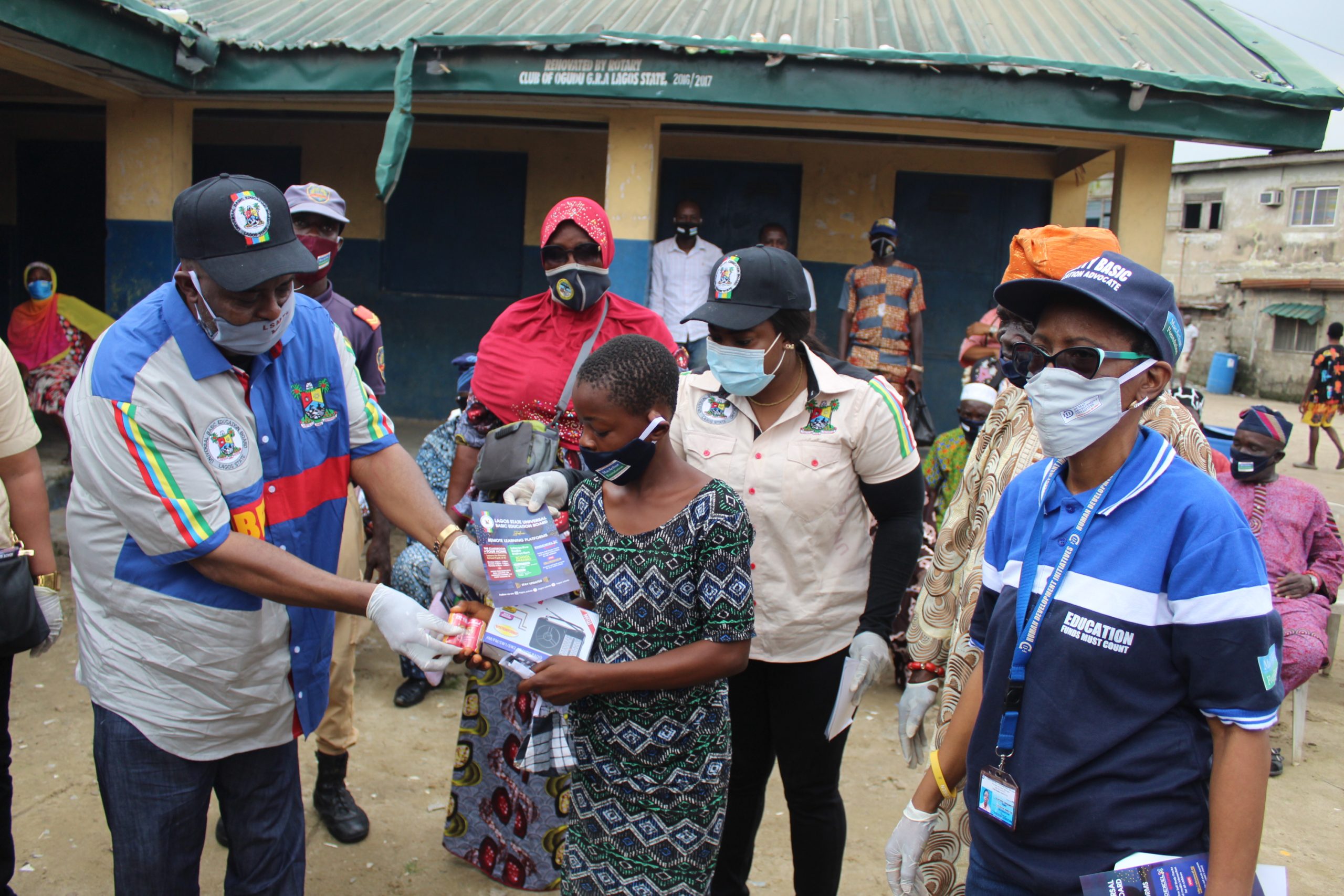 COVID-19: HDI Nigeria Distributes Hand-Held Radio, Facemasks to 500 Lagos Pupils